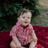 Barnley deep red checked short sleeve romper snap detail showing quality press stud closure