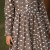 Miley horse print chocolate dress fabric detail showing beautiful horse print on chocolate fabric