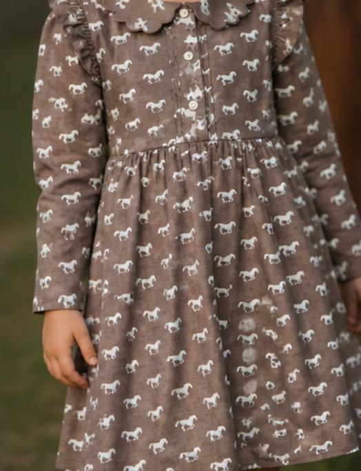 Miley horse print chocolate dress fabric detail showing beautiful horse print on chocolate fabric