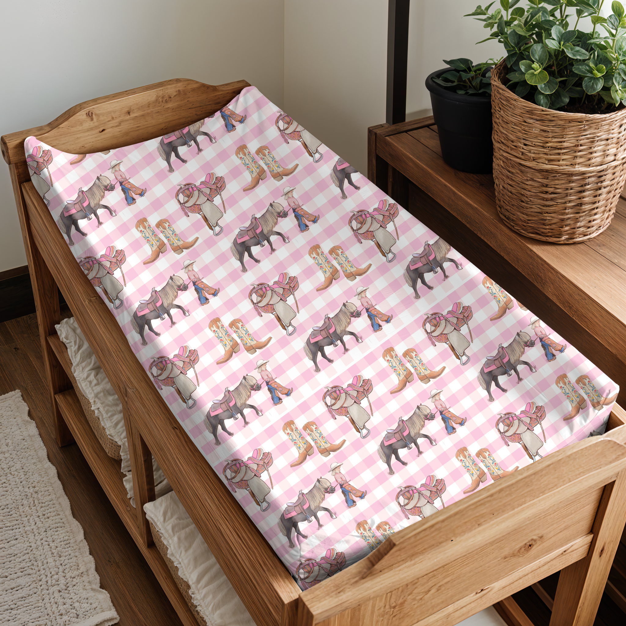 Cowgirl Life 2in1 bassinet and change table cover in use showing cover fitted to bassinet with cowgirl print