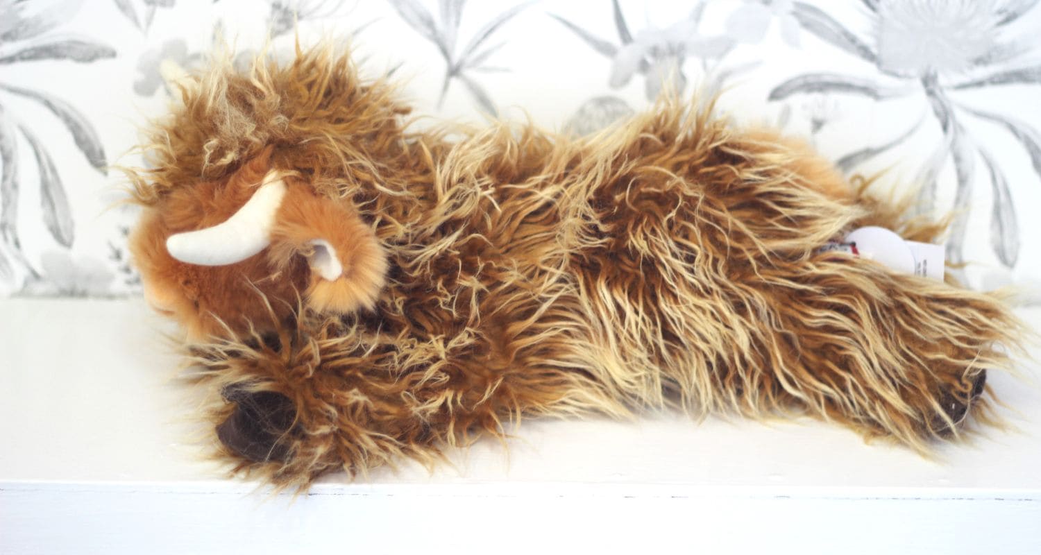 Wallace DLux Highland Cow plush from behind showing fluffy shaggy coat, great gift for farm lovers