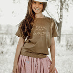 Bella soft dust pink textured tutu worn by girl showing beautiful pink layered tutu