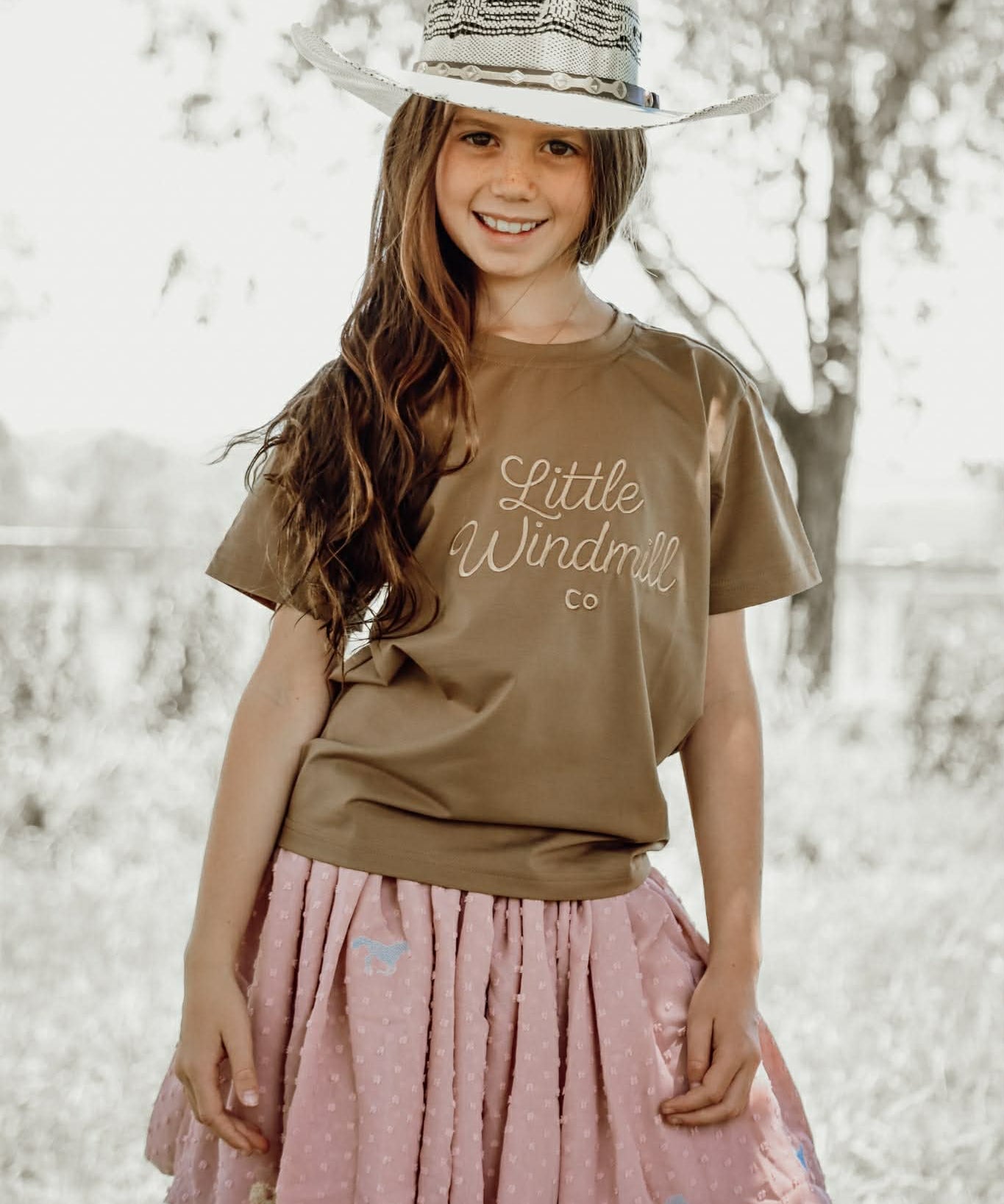 Bella soft dust pink textured tutu worn by girl showing beautiful pink layered tutu