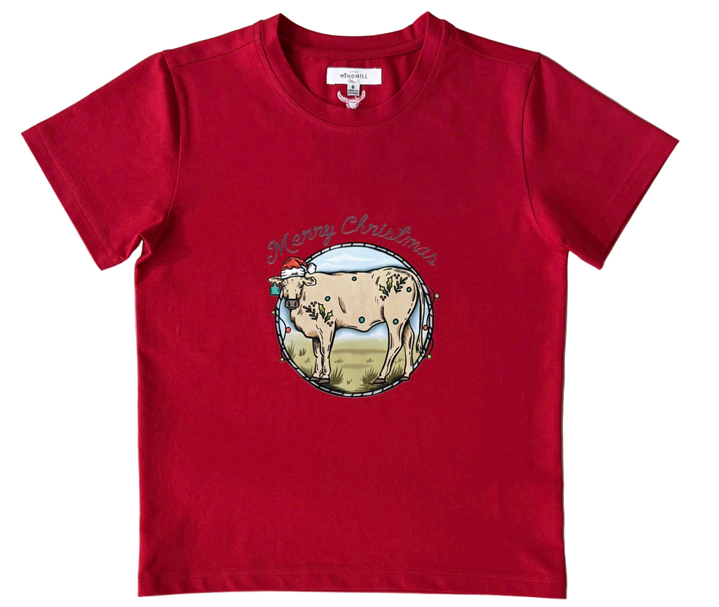 Red t-shirt with a cow graphic and text on a gray background