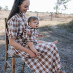Mum and baby boy in matching brown gingham