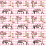 Cowgirl Life fitted cot sheet on cot showing cowgirl print fitted to standard cot mattress