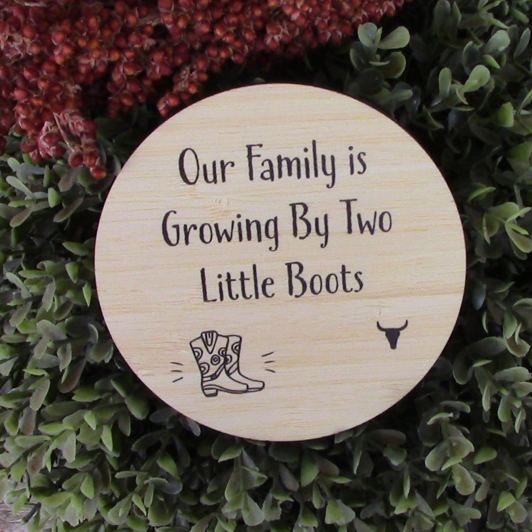 Growing By Two Little Boots engraved wooden plaque for family announcement on pine wood
