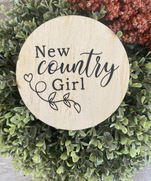 Round engraved country girl wooden plaque on natural pine with decorative leaf design