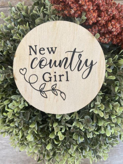 Round engraved country girl wooden plaque on natural pine with decorative leaf design